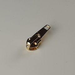 1 Schieber f�r 1 m Rei�verschluss metallisiert GOLD 6,5 mm Spirale