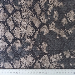RESTST�CK 50 cm Jerseystoff Schlangenmuster Animal Print Glitzerpunkte, taupe grau