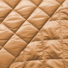Steppstoff Rauten wattiert matt gl�nzend, goldbraun