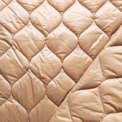 Steppstoff gro�e Tropfen wattiert matt gl�nzend, hellbraun