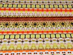 Jerseystoff Ethnomuster Batik Ibiza Style Digitaldruck, orange braun schwarz