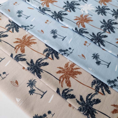 Jerseystoff Palmen, dunkelblau braun hellblau