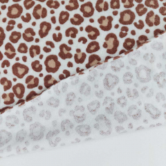 Sweat Frottee Stoff Leopardenmuster beig braun elastisch Meterware