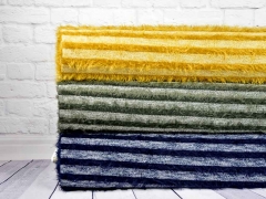 Strickstoff Streifen Fransen Meterware, dunkelblau