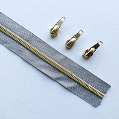 1 m Rei�verschluss metallisiert GOLD 6,5mm Spirale + 3 Schieber, mittelgrau