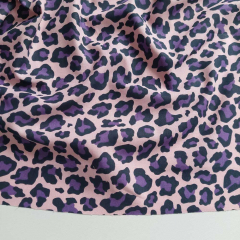 Baumwollstoff Leopardenmuster nude lila blauschwarz Meterware